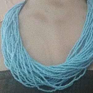Multi strand twisted statement turquoise necklace